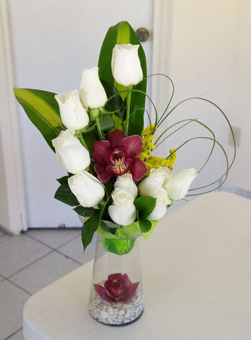 7 rosas y orquideas